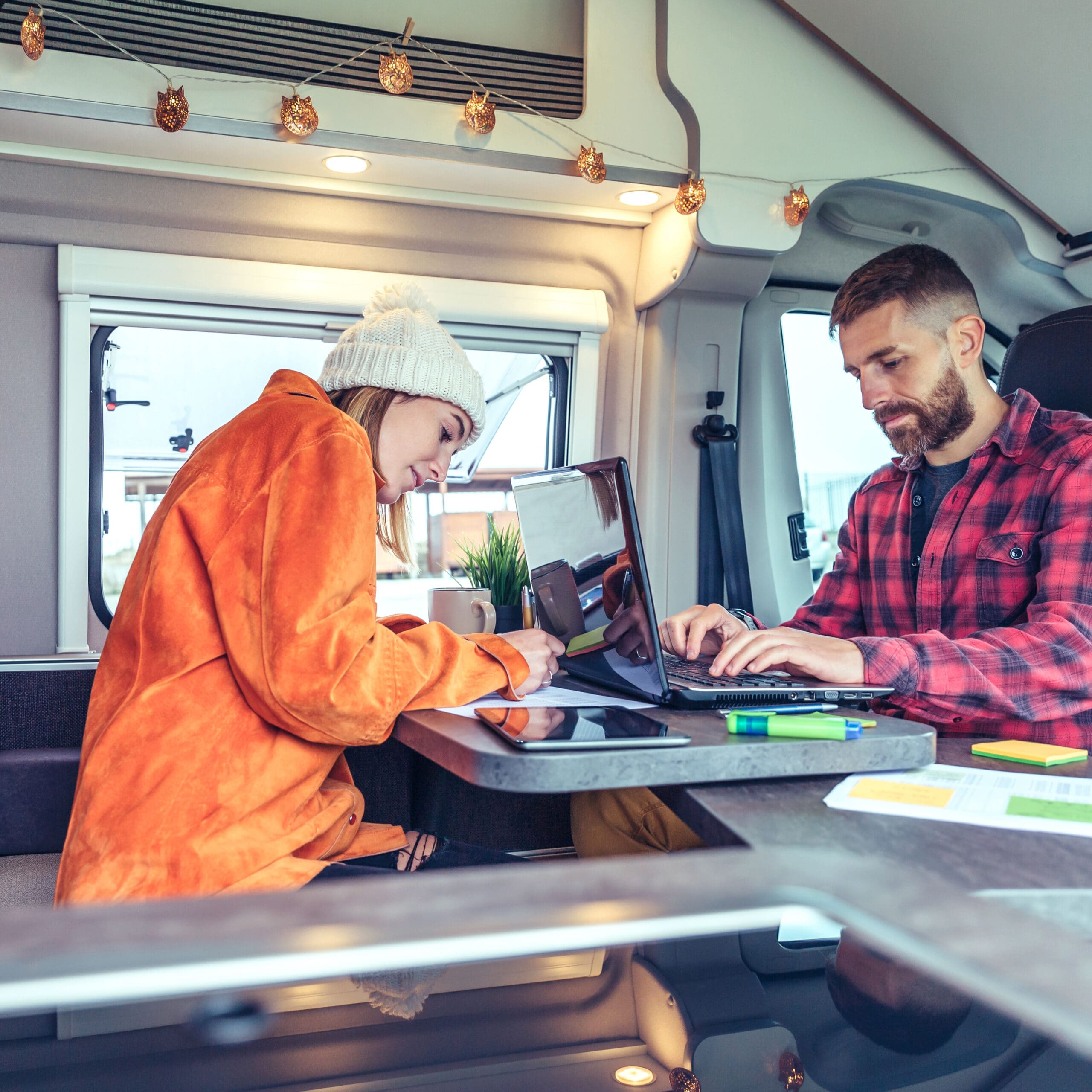 A protective barrier installed around the base of an RV to enclose the underside and act as a shield. Adding skirting is one of the most effective ways to improve insulation, conserve heat, and protect plumbing during winter camping. Skirting material can vary from insulated vinyl panels to heavy-duty fabric, to foam boards or DIY options made of plywood or corrugated plastic. Professionally made skirting can cost $1,000 to $3,000, while DIY solutions may be as low as $200 to $500. Installation and removal are straightforward, but some options may require more effort due to weight. Figure a moderate amount of storage space. – Winter family2 scaled 1
